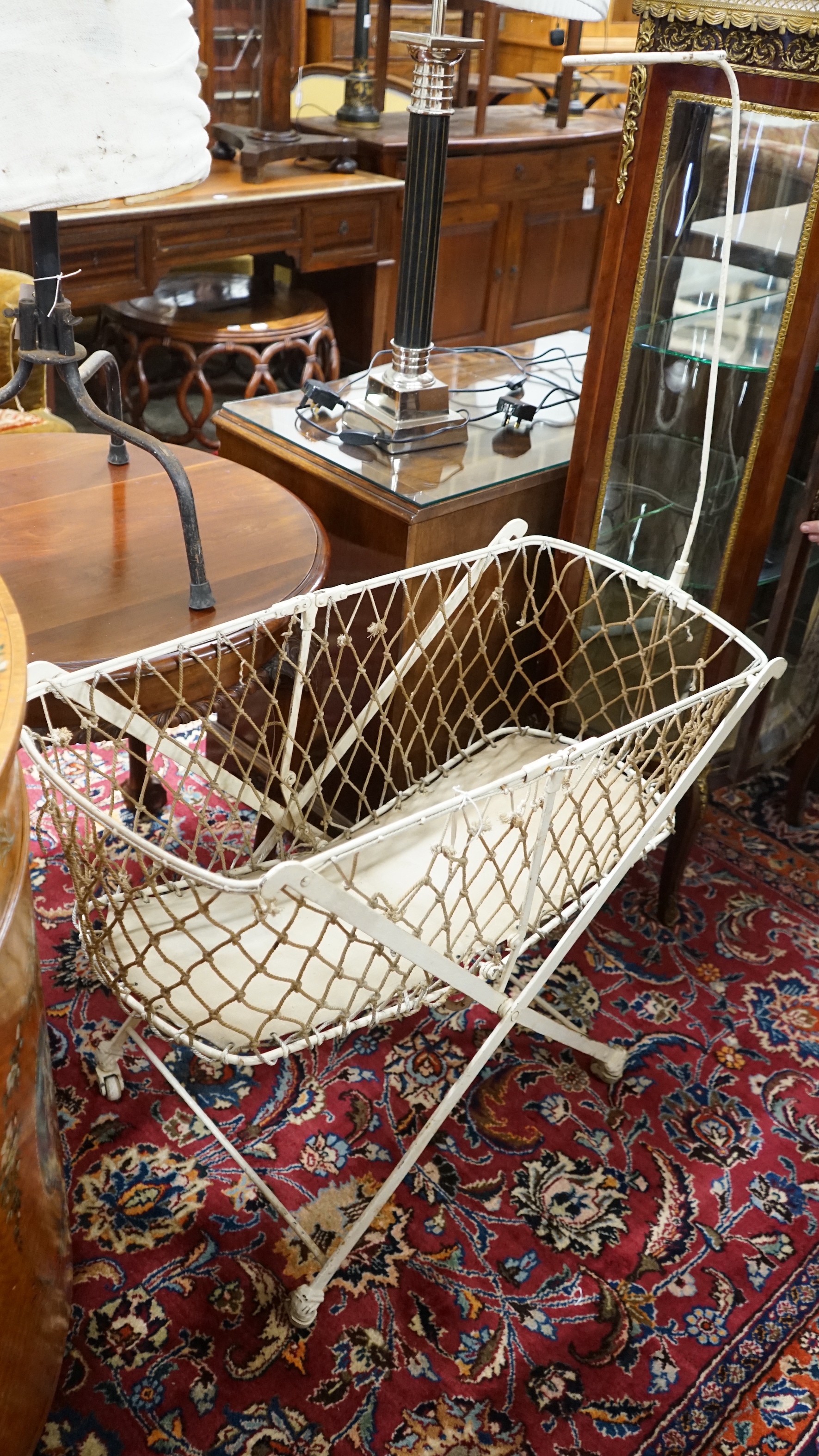 A Victorian metal folding crib, length 90cm, depth 43cm, height 134cm